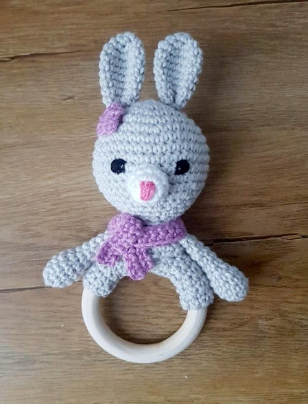 purple and grey bunny ring rattle with embroidered eyes for baby's safety